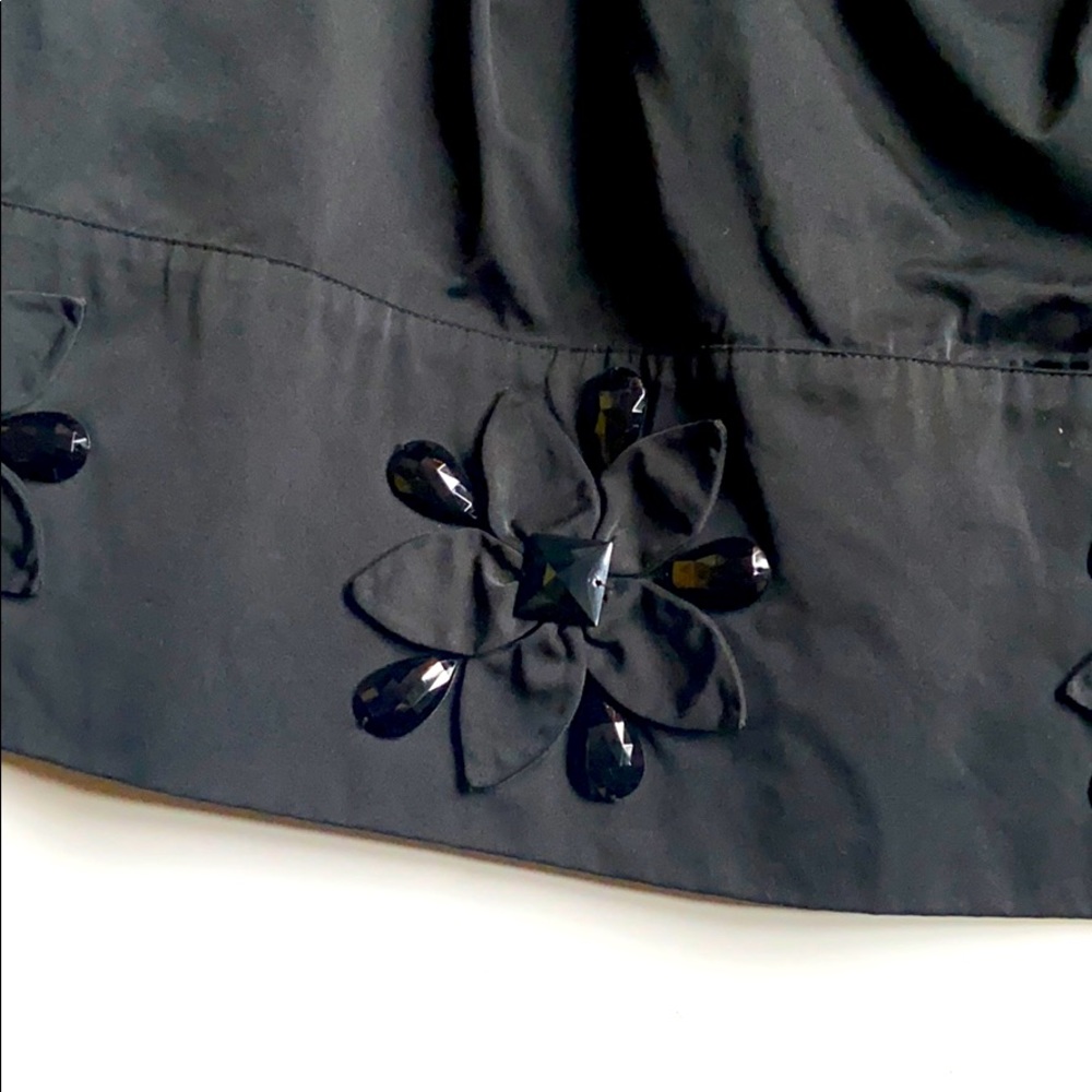 Black skirt with floral rhinestone appliqué